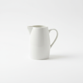 White porcelain jug side view